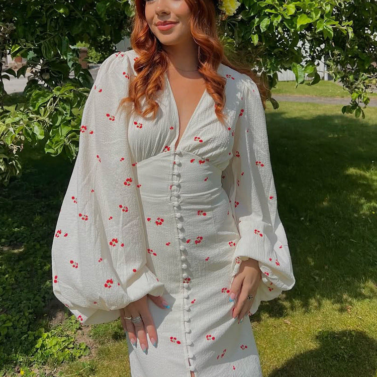 Ladies midi dress with puff sleeves, V-neckline and decorative button placket Chichicherry