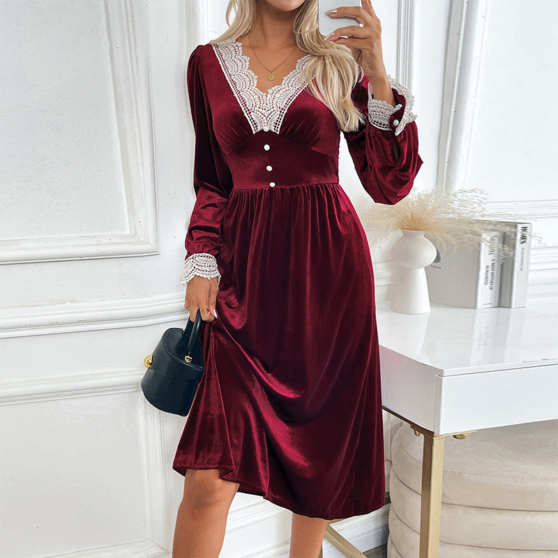 Women's velvet midi dress with lace decoration, V neckline and fitted empire silhouette.