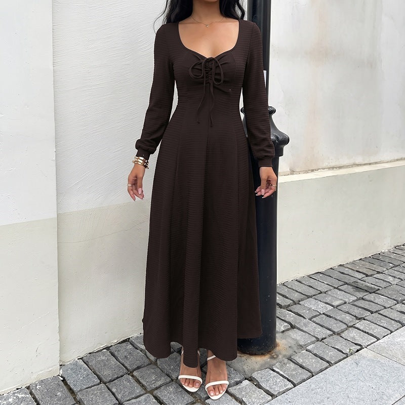 Women's midi dress made of ribbed fine knit with lace-up neckline, fitted A-line and long sleeves