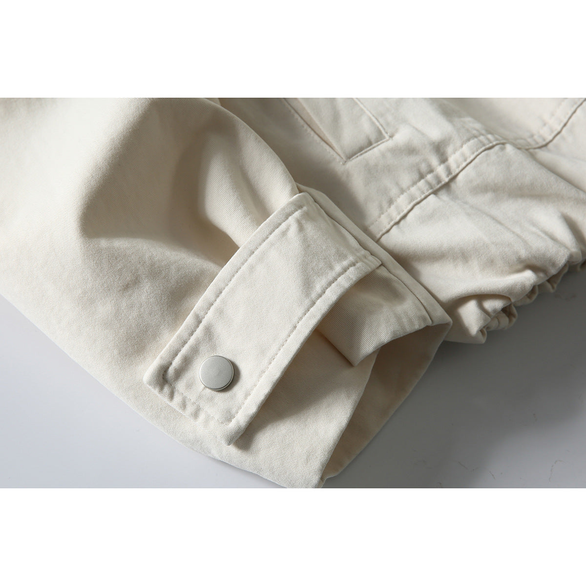 Men's short-cut boxy blouson jacket with faux leather collar, drawstring hem, and snap button cuffs Chichicherry