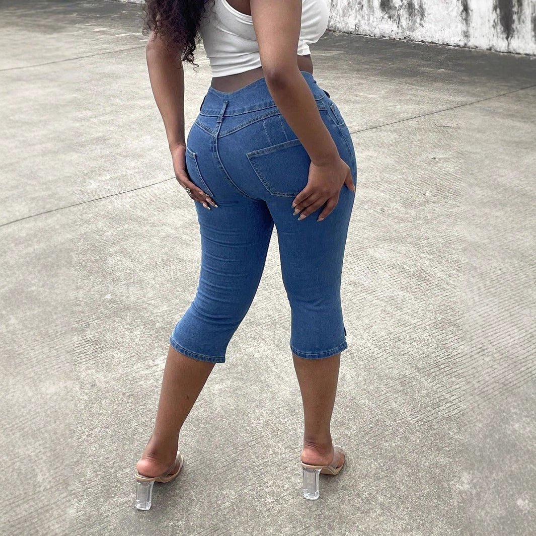 Women's high-waisted, three-quarter length stretch jeans with destroyed inserts and side seam slit Chichicherry