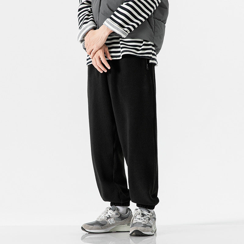 Men's wide-cut fleece jogging pants with elastic cuffs and side pockets Chichicherry
