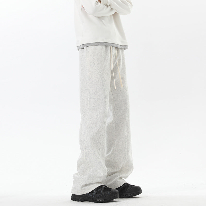 Men's oversized sweatpants in baggy cut with drawstring and decorative seams Chichicherry