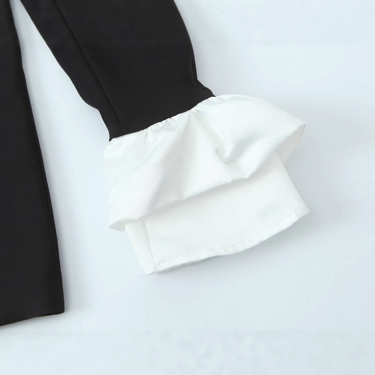Women's statement blazer with contrasting shawl collar and ruffle cuffs Chichicherry