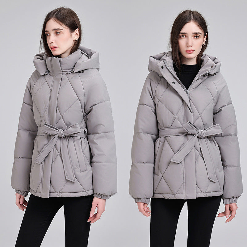 Women's luxury short puffer jacket with integrated wind protection collar and waist belt Chichicherry