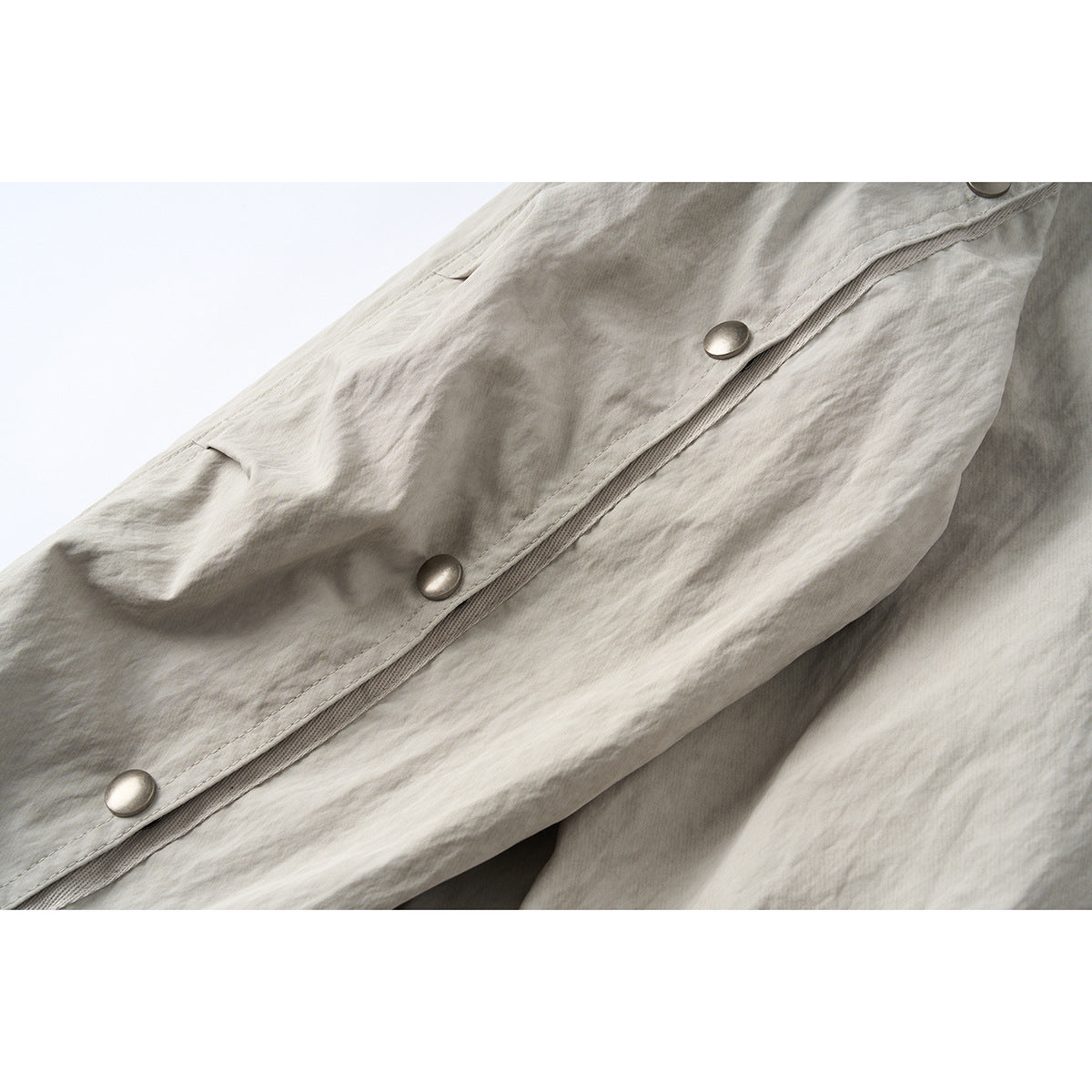 Unisex Short Jacket in minimalist Workwear look with high stand-up collar and snap button closure Chichicherry