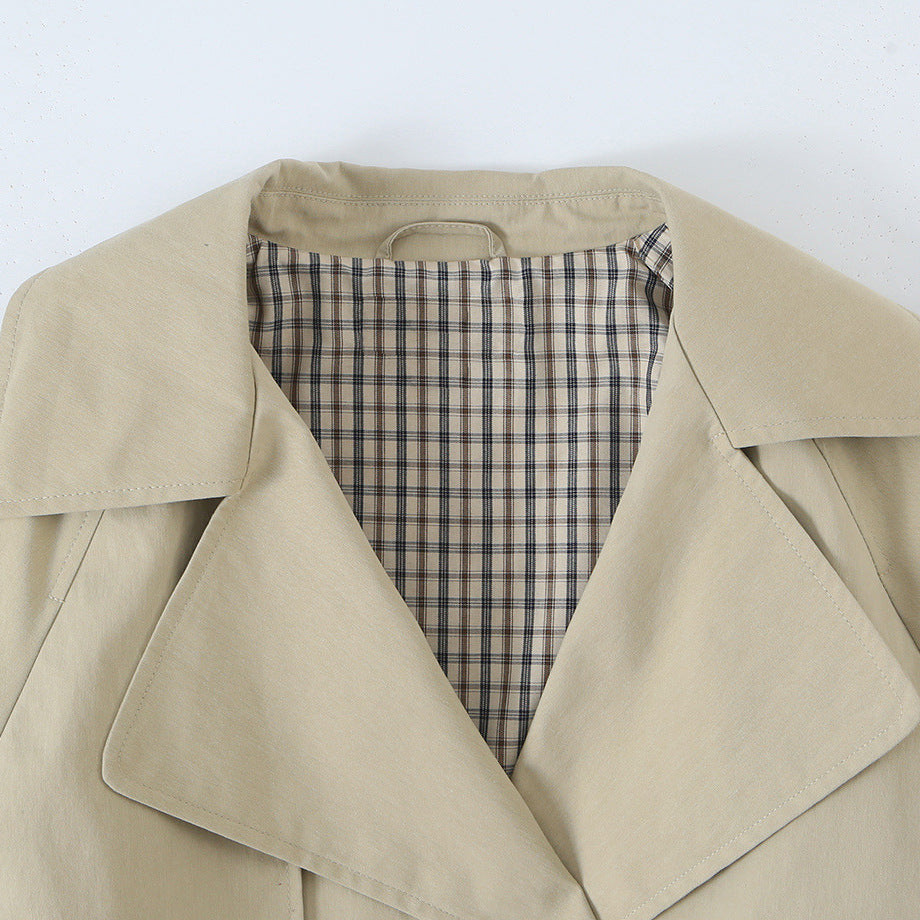 Women's short trench-style jacket with adjustable drawstring and eye-catching lapel Chichicherry