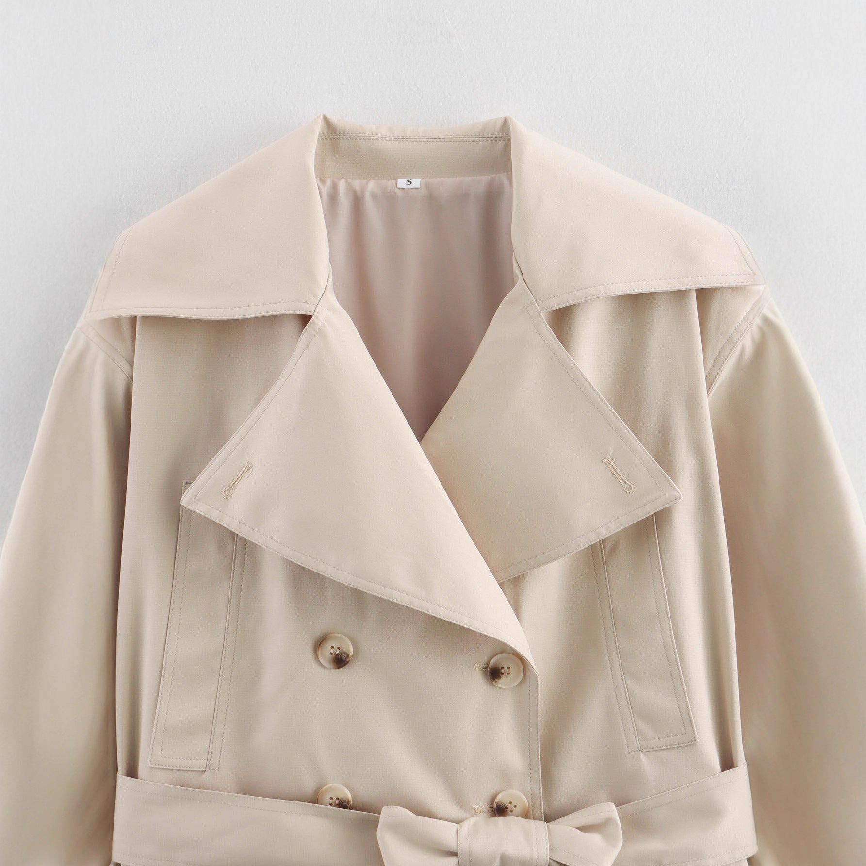 Women Short Cropped Trench Coat with Wide Shawl Collar, Waist Belt to Tie and Decorative Cuffs Chichicherry