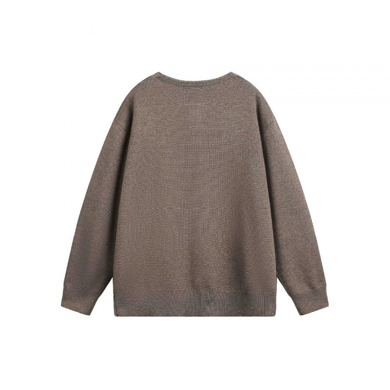 Unisex Oversize fine knit pullover with short Henley closure and structured mélange quality Chichicherry