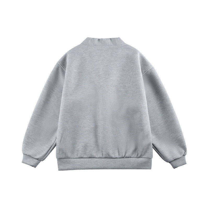 Unisex Boxy knit cardigan in waffle knit with V-neck, continuous button placket, and applied round pockets Chichicherry