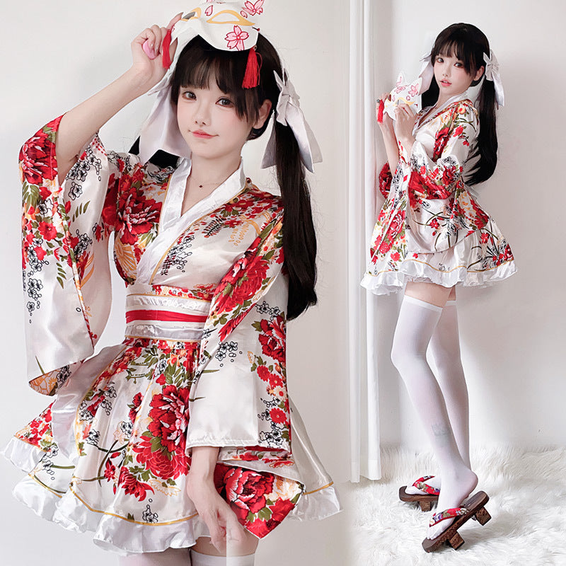 Women's traditional kimono dress with flowing sleeves and floral pattern Chichicherry