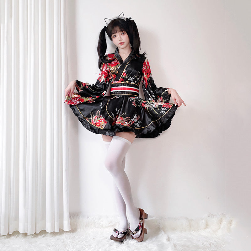Ladies Kimono Dress with a playful cut and floral accents Chichicherry