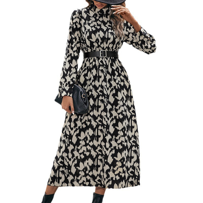 Women's midi dress with animal-inspired print, stand collar and fitted belt Chichicherry