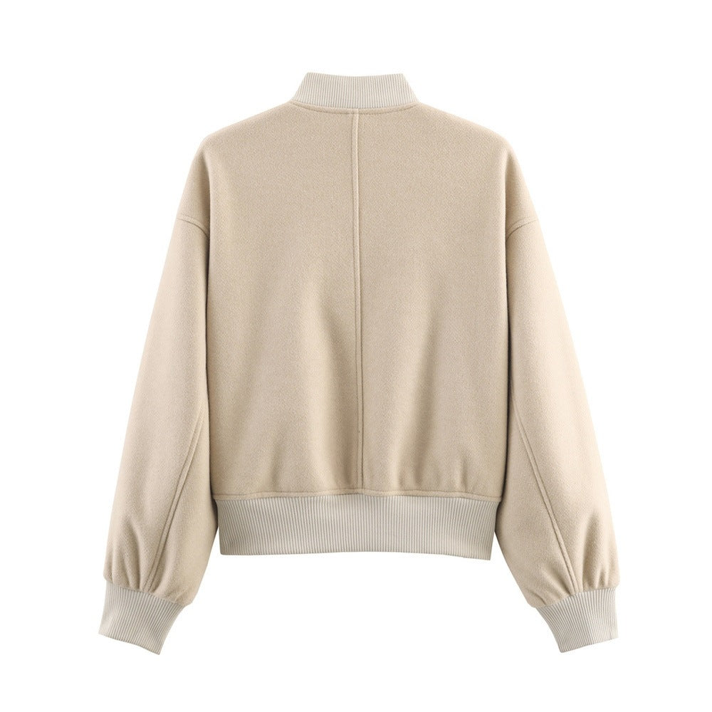 Ladies short boxy bomber jacket with ribbed collar, snap button closure, and pockets Chichicherry