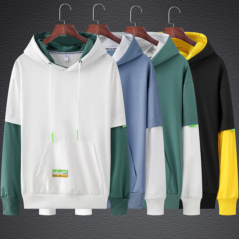 Men's hoodie in layered look with contrast sleeves, kangaroo pocket, and oversized cut Chichicherry