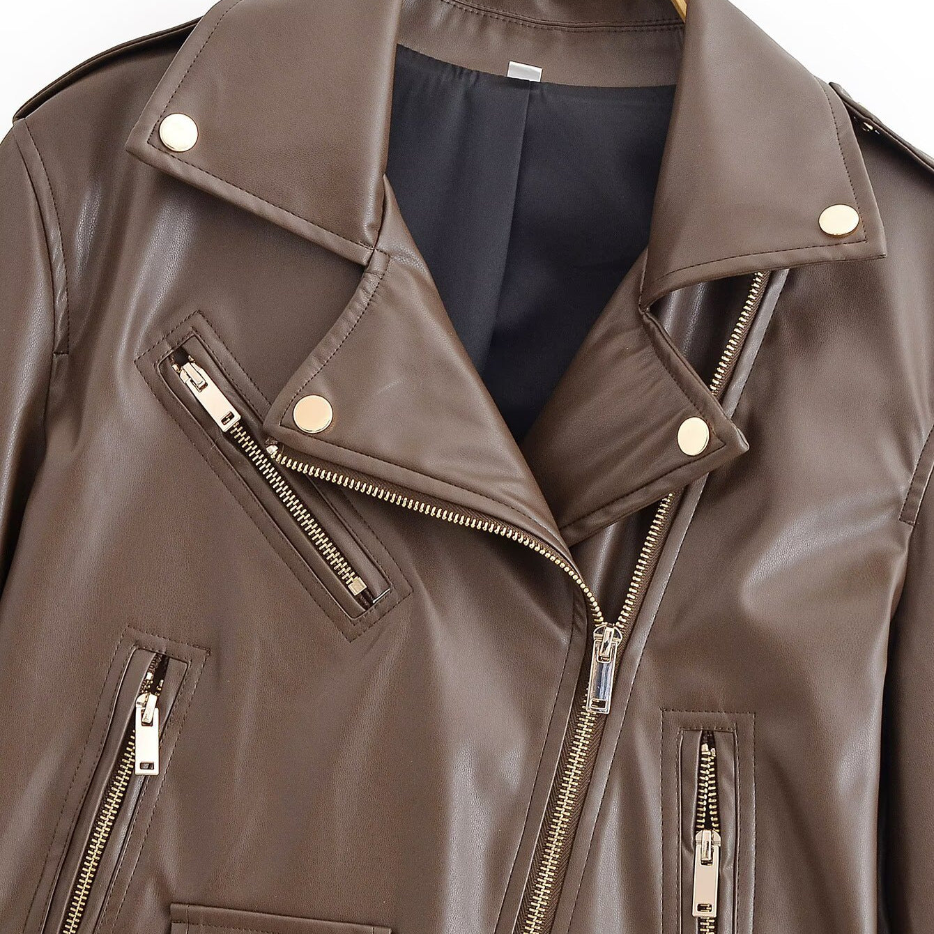 Women's biker jacket made of faux leather with asymmetrical zipper, waist belt, and gold-colored details Chichicherry