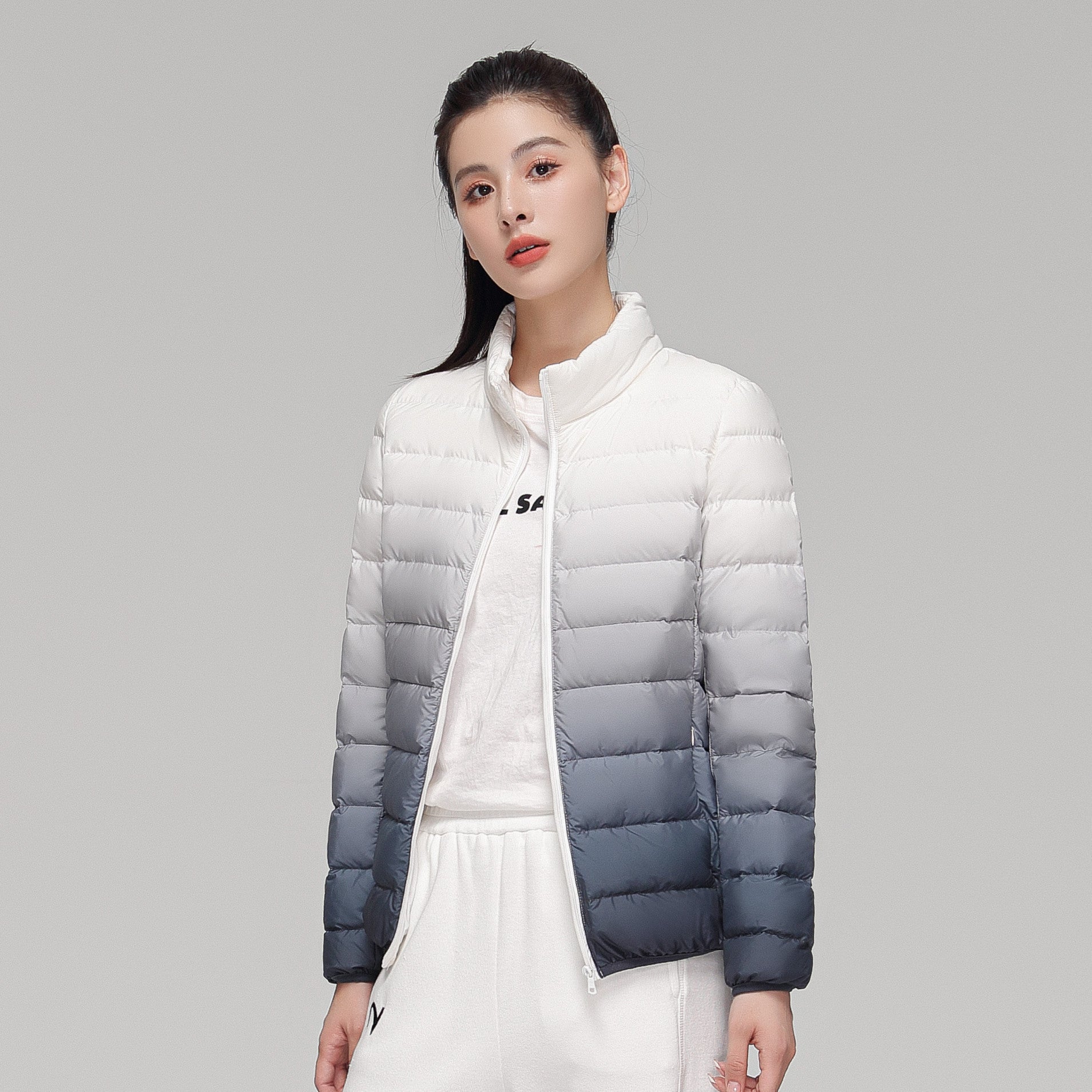 Women's ultra-lightweight hooded quilted jacket with compact pack size and wind-resistant shell Chichicherry