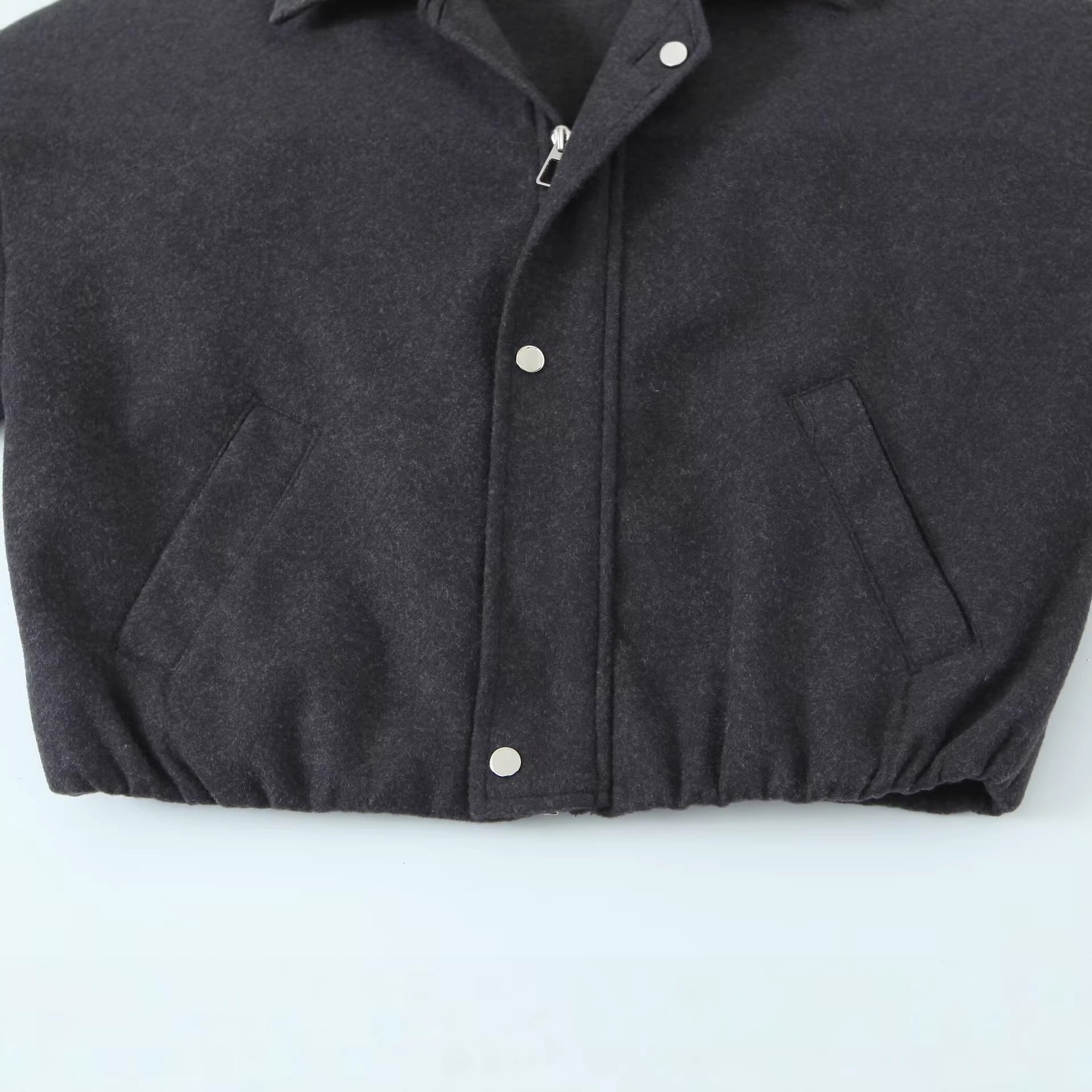 Women's short-cut wool blouson jacket with stand-up collar, snap button placket, and elastic hem Chichicherry