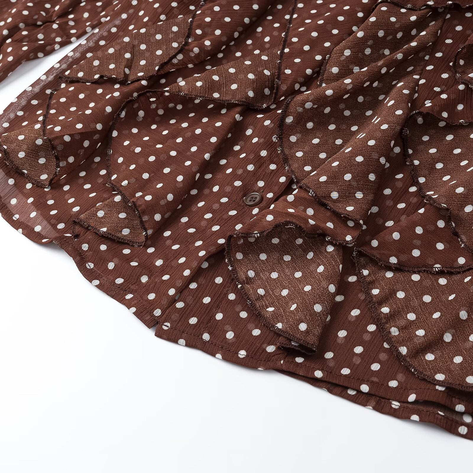 Women's semi-transparent chiffon blouse with dots, ruffle details and bow collar Chichicherry