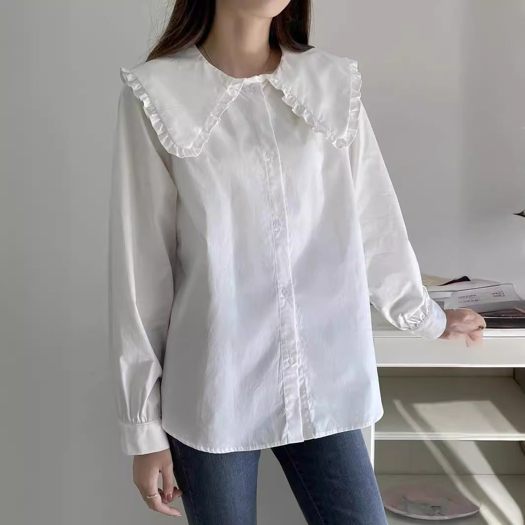 Women's blouse with oversized ruffle collar and finely crafted tailoring Chichicherry