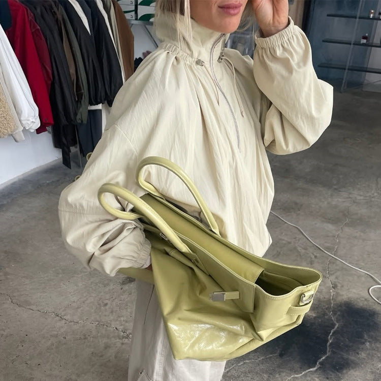 Women's Oversize Windbreaker with high stand-up collar, drawstring shoulder yoke, and balloon sleeves Chichicherry