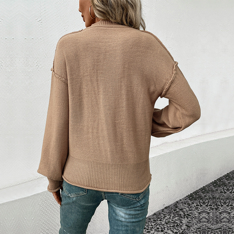 Women's Oversize Round Neck Knitted Sweater with Patch Chest Pocket and Fringed Hem Seam Chichicherry