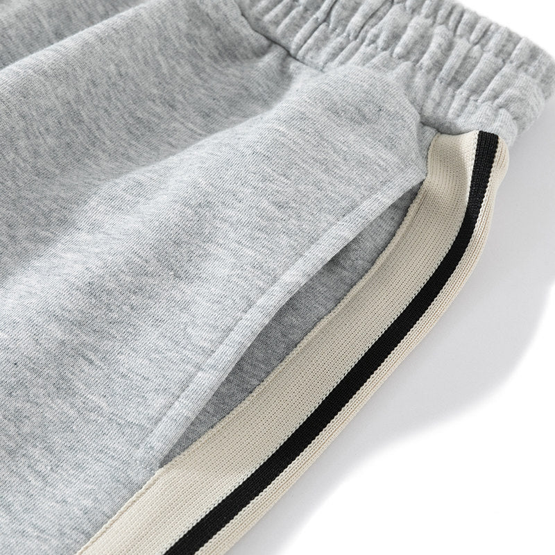 Men's loose-fitting joggers with elastic waistband, drawstring, and contrasting side stripes Chichicherry