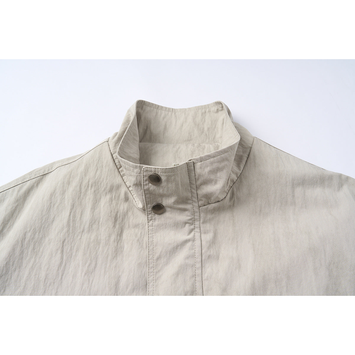Unisex Short Jacket in minimalist Workwear look with high stand-up collar and snap button closure Chichicherry