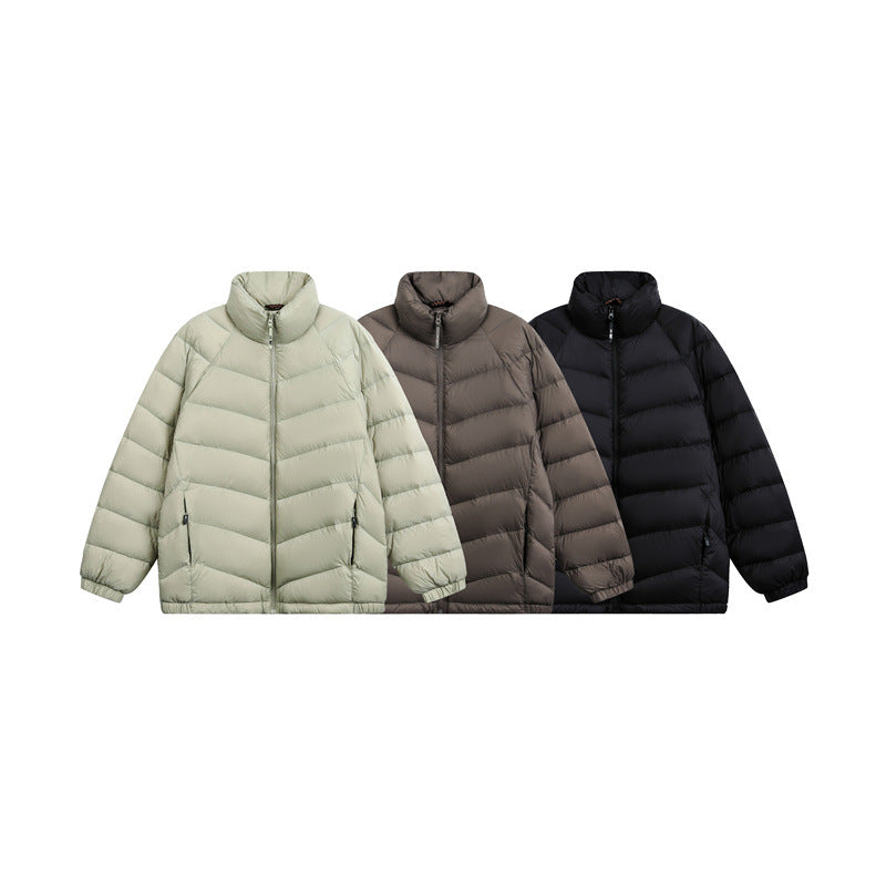 Unisex Short cut padded jacket in boxy fit with chevron quilting and high collar Chichicherry