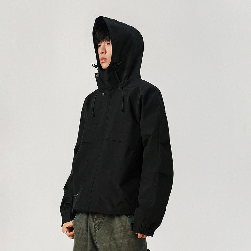 Men's technical hooded softshell jacket with high collar and adjustable hem Chichicherry