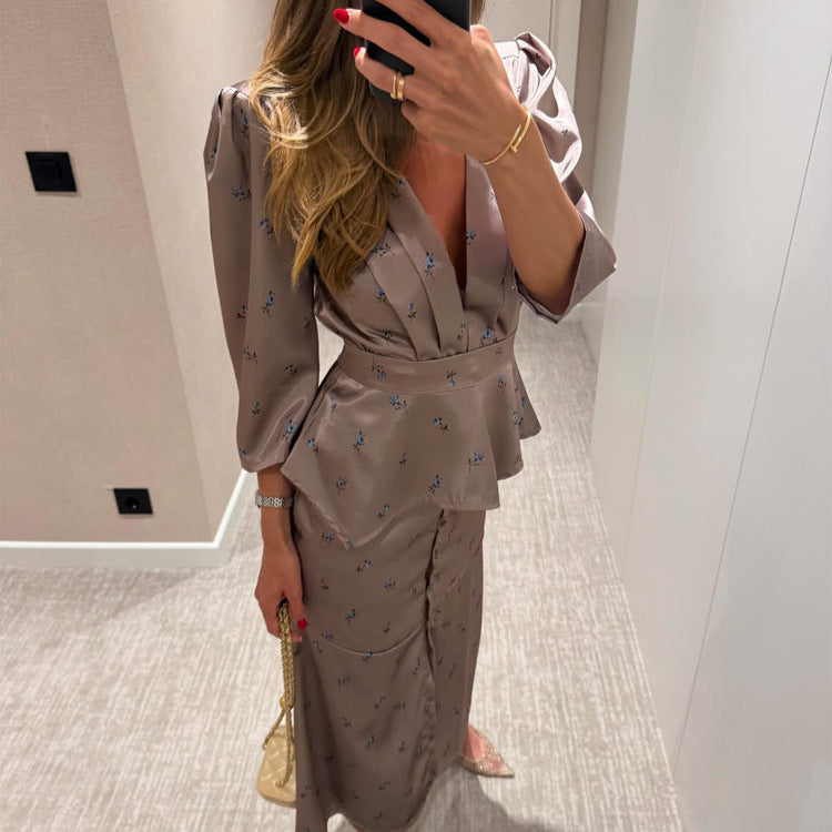 Women's satin two-piece set with tailored peplum top, deep V-neckline and button-up midi skirt Chichicherry