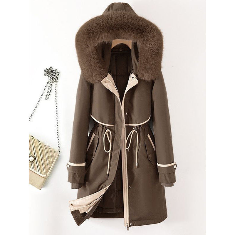 Women's long parka with faux fur hood, waist drawstring, and contrasting piping Chichicherry