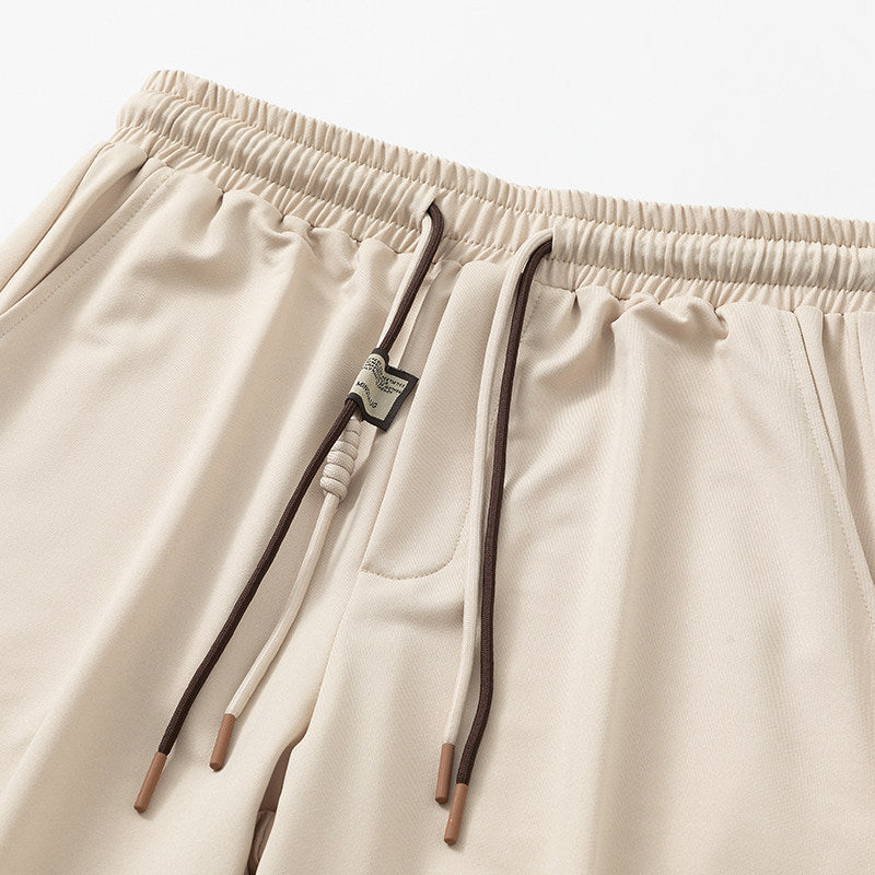 Men's Comfort Jogging Pants with sustainable interlock stretch, concealed side pockets & elastic ankle cuffs Chichicherry