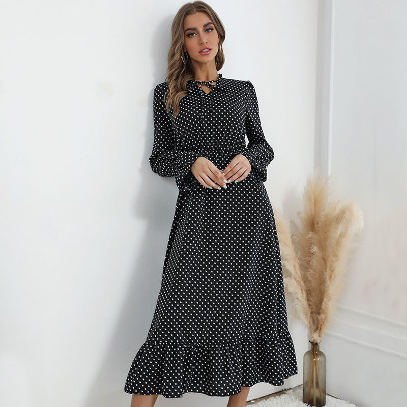 Women's maxi dress with polka dot print, gathered waist, bow collar and ruffled hem Chichicherry