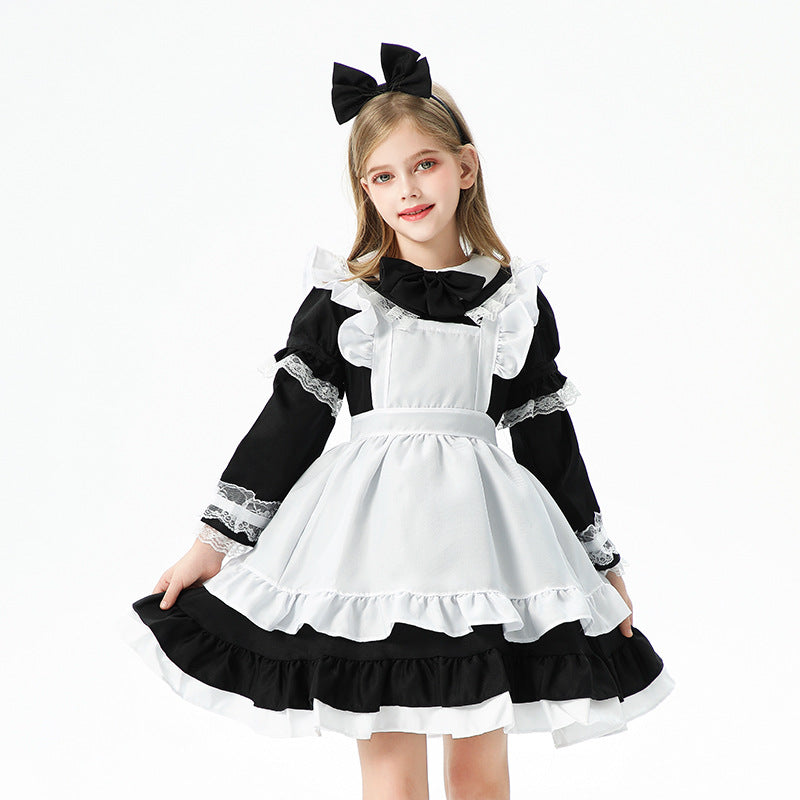 Girl's playful maid dress with ruffle details Chichicherry