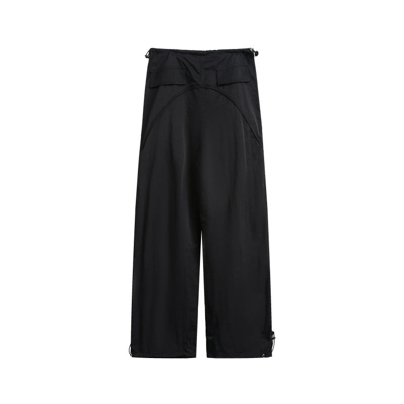 Women's wide cargo pants with drawstring waistband and adjustable hem