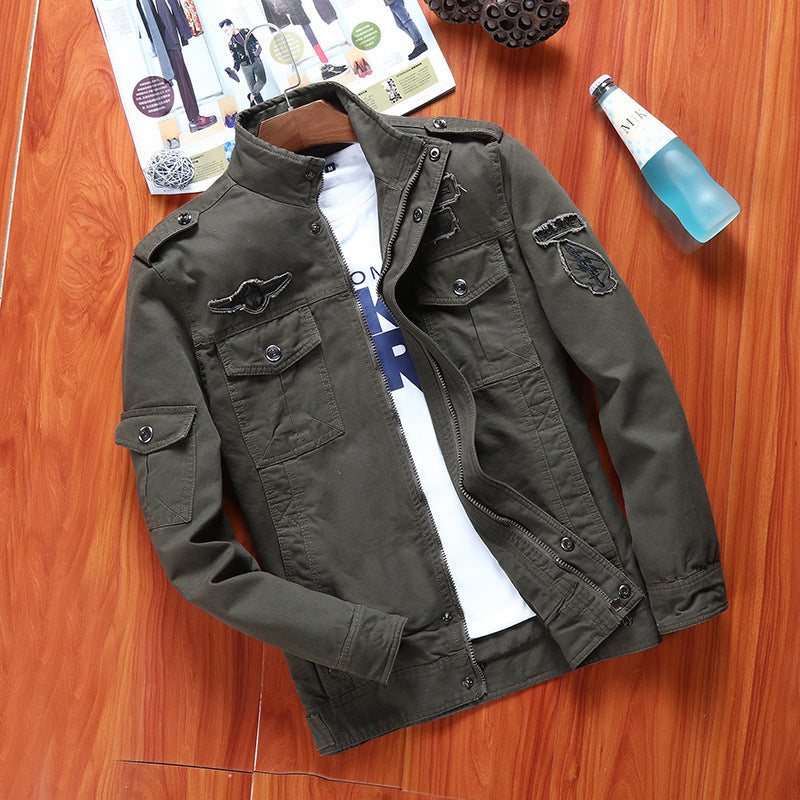 Men's canvas field jacket in military utility style with stand-up collar, shoulder patches, and multi-functional pockets Chichicherry