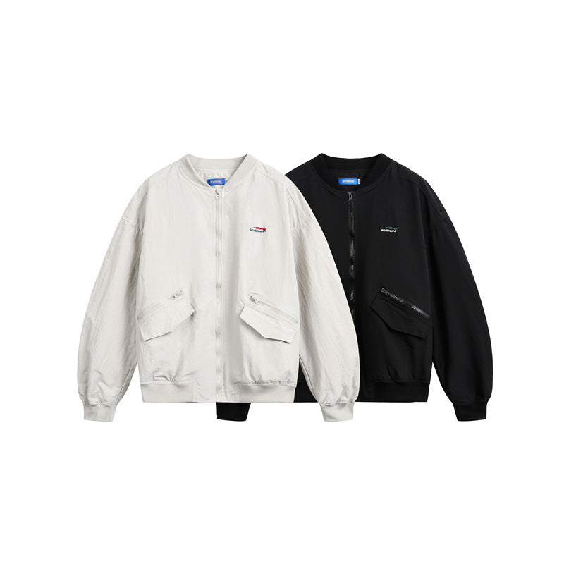 Unisex short cut lightweight nylon bomber jacket with utility pockets and ribbed hem Chichicherry