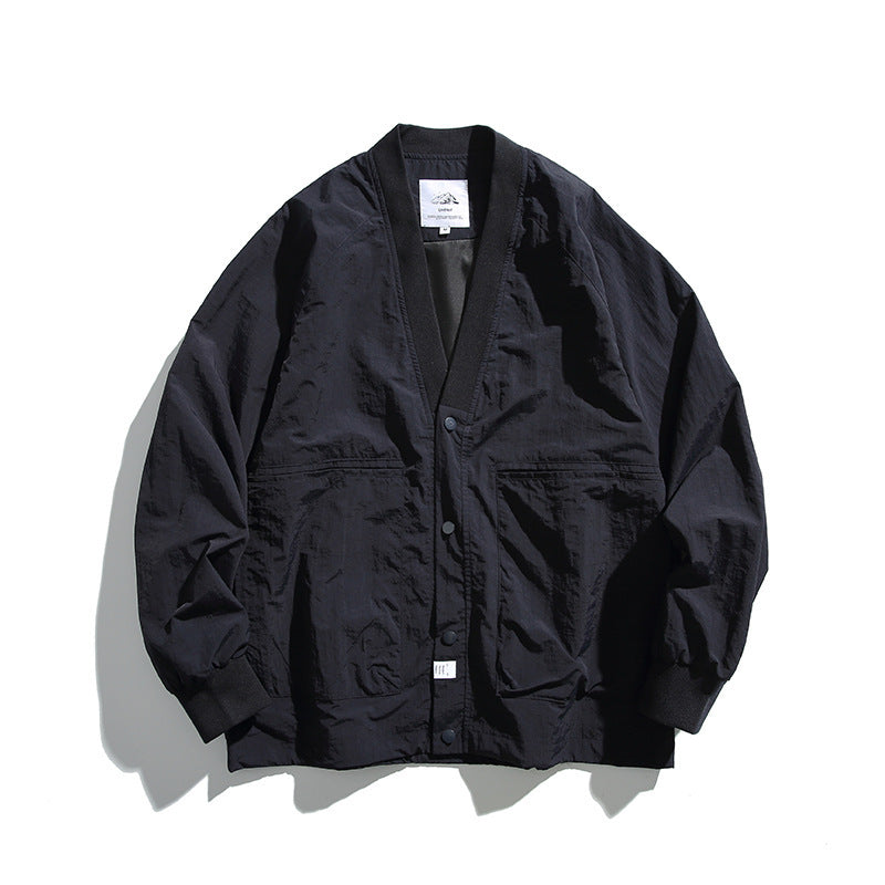 Unisex Oversized Lightweight Transitional Jacket with V-Neck and Snap Button Placket Chichicherry