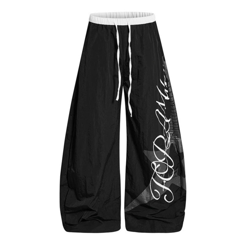 Women's Wide Palazzo Trousers with Drawstring Waist and Large Statement Print Chichicherry