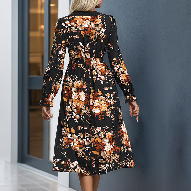 Women’s midi dress with fitted waist, V-neck, long sleeves, and floral all-over print Chichicherry
