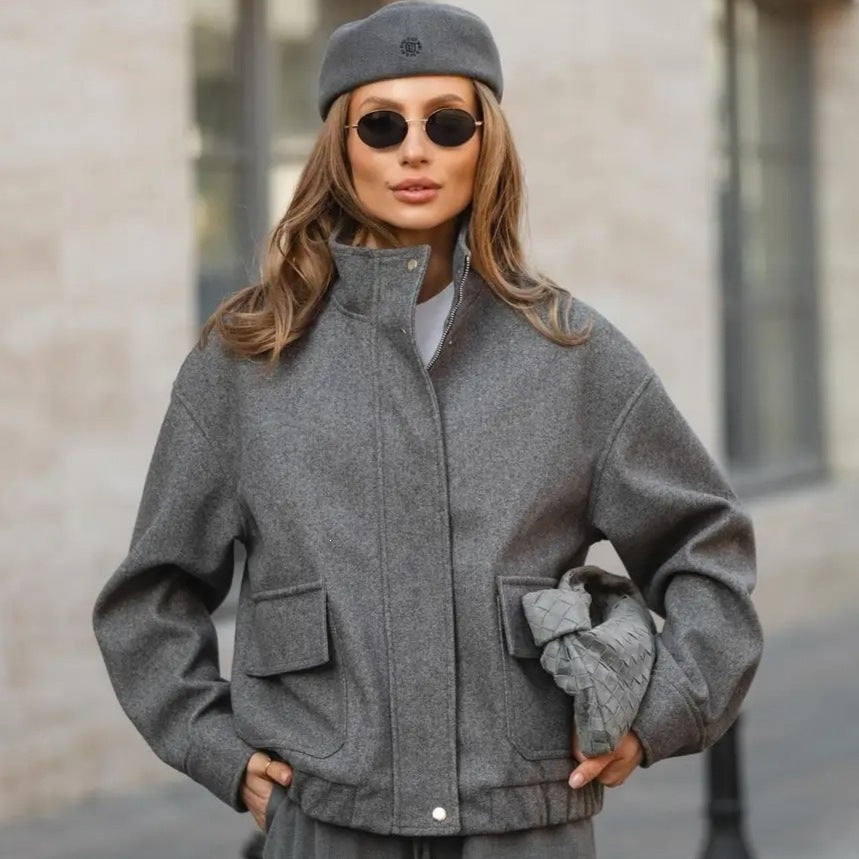 Women’s short jacket made of wool blend in utility look with stand-up collar, flap pockets, and elastic hem Chichicherry