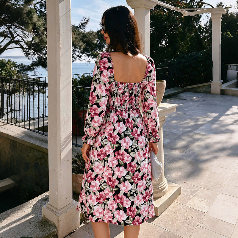 Women's maxi dress with gathered smocking fit, square neckline, long puff sleeves, and high slit. Chichicherry