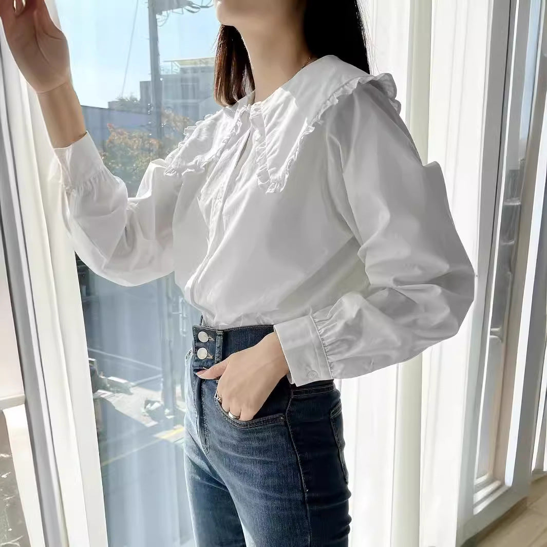 Women's blouse with oversized ruffle collar and finely crafted tailoring Chichicherry