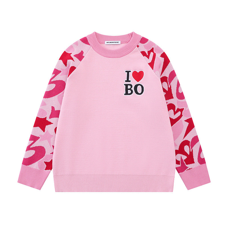 Women's knit sweater with raglan sleeves, statement jacquard sleeves, and ribbed hem Chichicherry