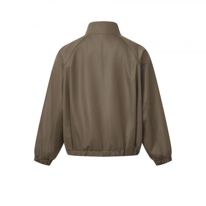 Men's short cut faux leather bomber jacket with stand-up collar, raglan sleeves, and elastic hem Chichicherry
