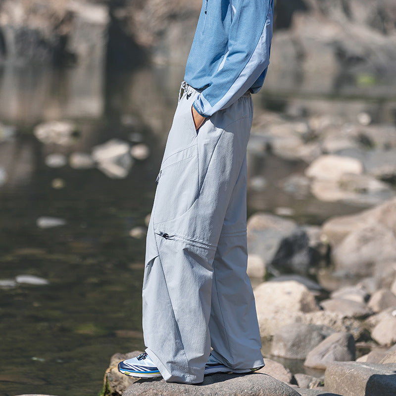 Men's loose technical cargo pants with drawstring, zipper pockets, and adjustable hem Chichicherry
