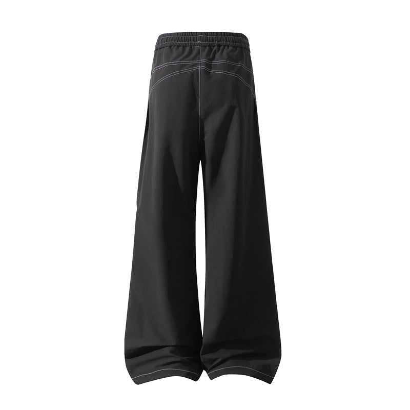 Men's Wide Cargo Pants with Drawstring Waistband, Utility Seams and Zip Pockets Chichicherry