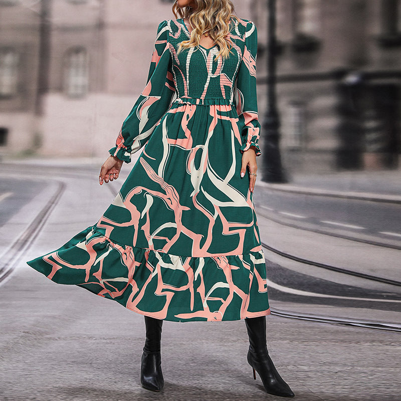 Women's midi dress with gathered smocked bodice, V-neckline and flared ruffle skirt Chichicherry