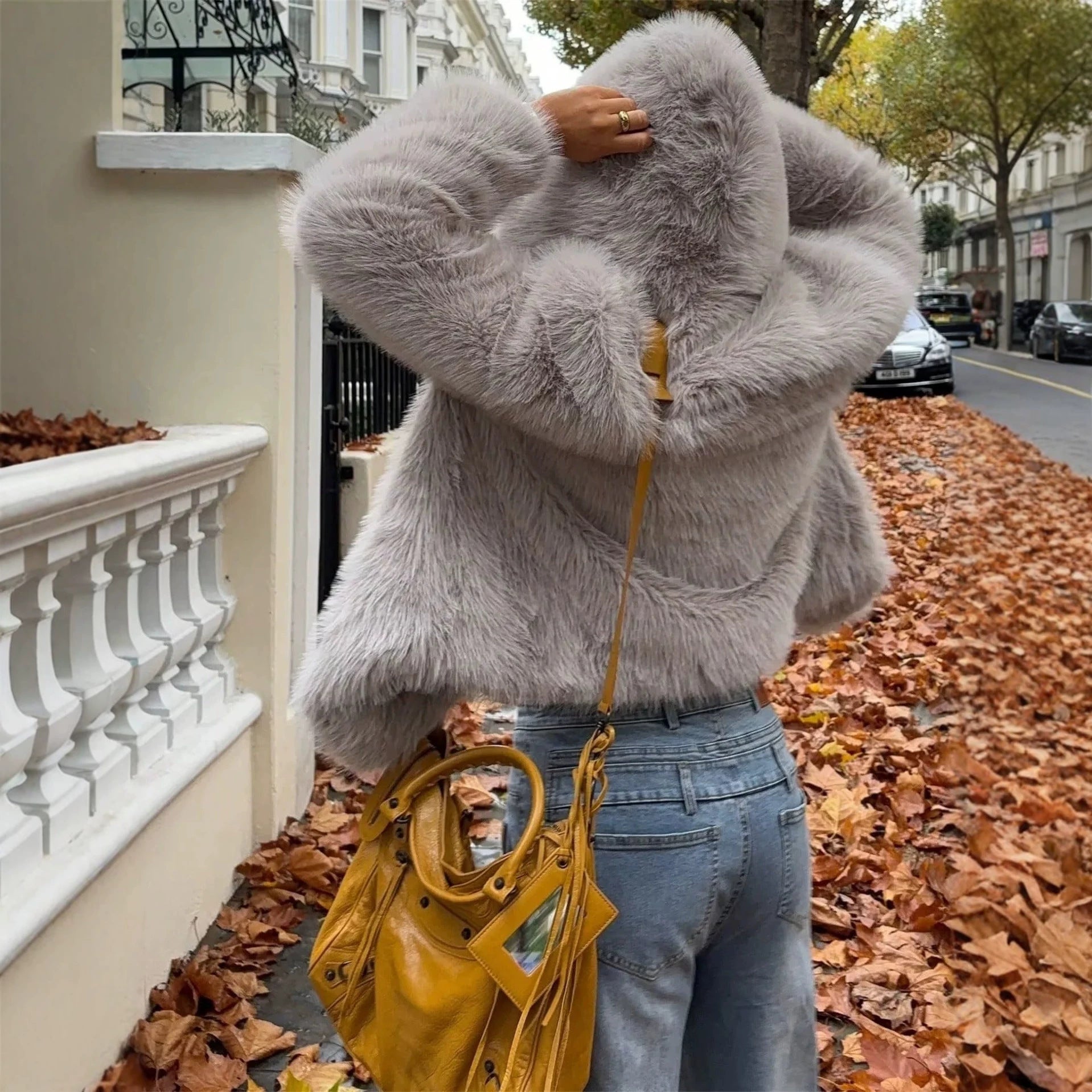 Women's Hooded Faux Fur Short Jacket with Dense Long Pile and Oversize Silhouette Chichicherry